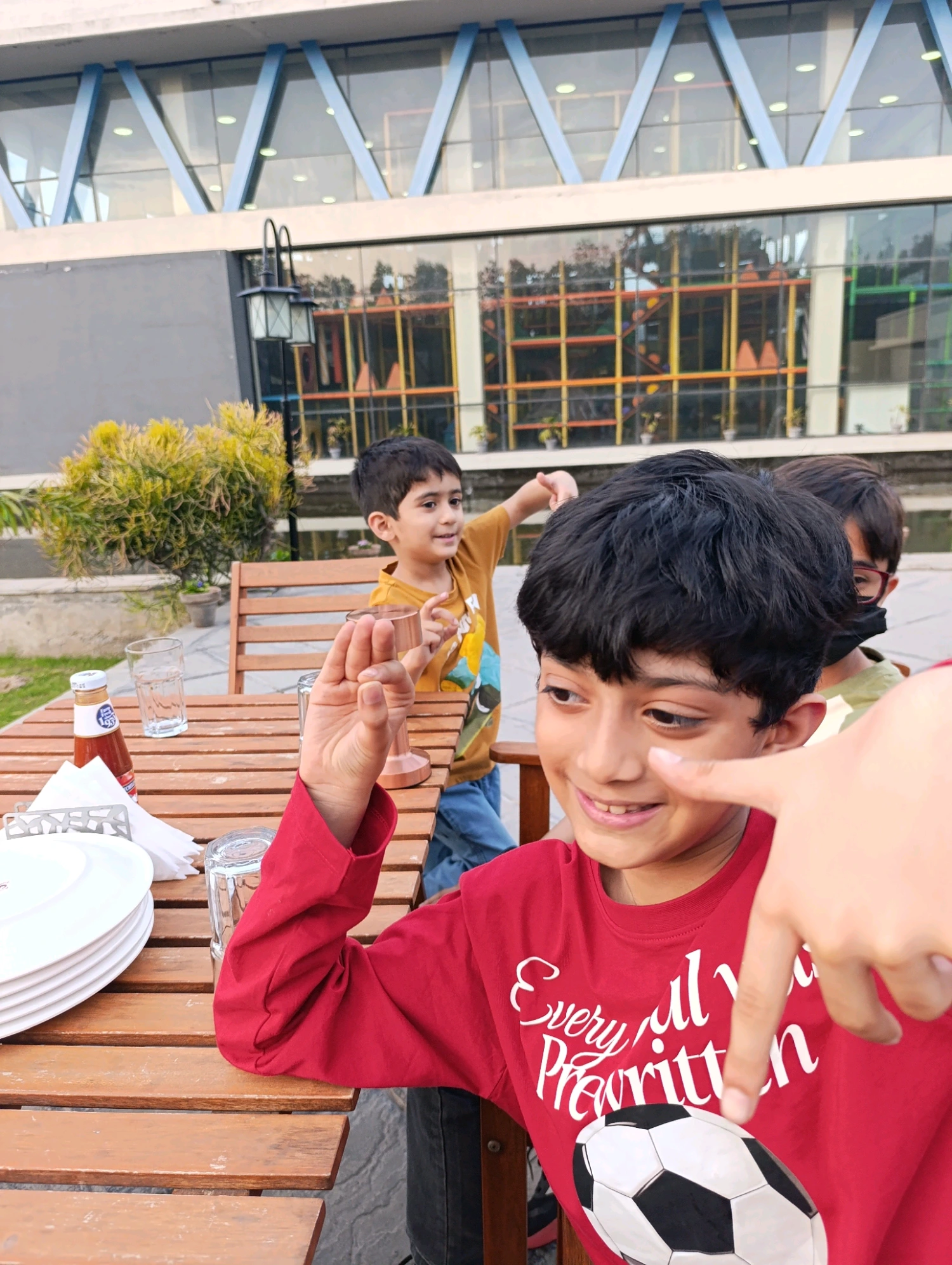 Original photo of kids at a table