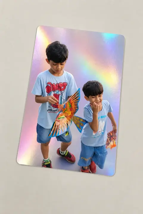 The same photograph of two children redrawn in Lineora's Portrait Photocard style